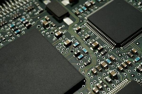 A PCB board containing an integrated circuit.