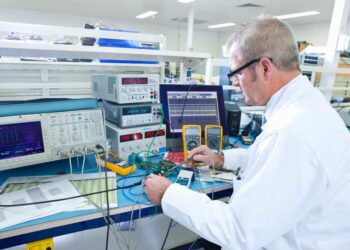 An engineer working on an oscilloscope- an application of high speed comparator