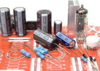 Loose and soldered components on PCB.