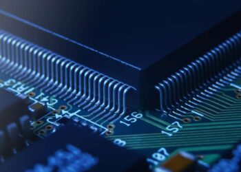 Application-specific integrated circuit in QFP package mounted on PCB