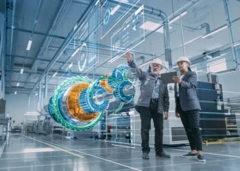 Industrial engineers visualize 3D CAD model of clean energy engine