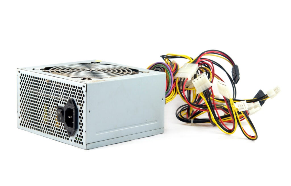 Computer power supply on white background.