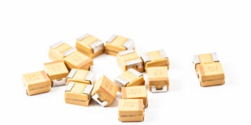 A view of tantalum capacitors that are often used for PCB layout bypass capacitors, on white background.