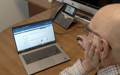 Engineer viewing the Arduino Opta dashboard.